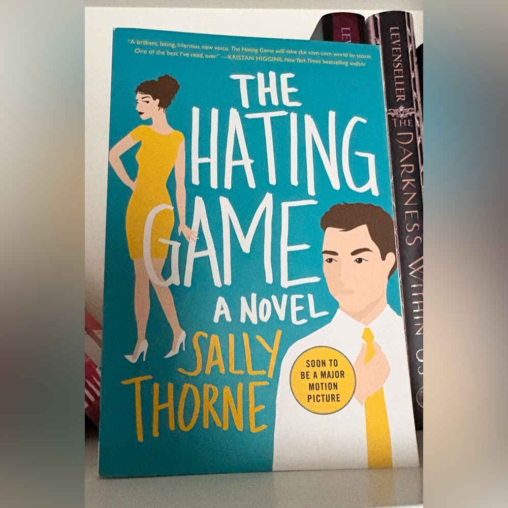 The Hating Game Novel by - Blue and Yellow Cover
